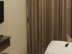 Indian wife on honeymooon trying different lingerie in front of her husband in hotel room who is filming her naked!. video2porn2